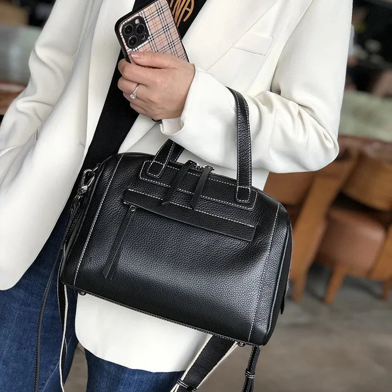 Genuine cowhide leather messenger bag with lychee pattern texture in horizontal square shape showing internal compartments