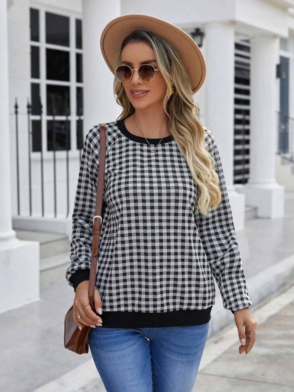 Black long sleeve pullover sweater with a Japanese sweet plaid and striped pattern.