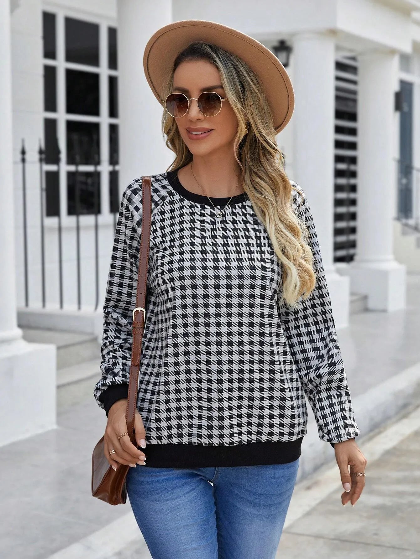 Black long sleeve pullover sweater with a Japanese sweet plaid and striped pattern.