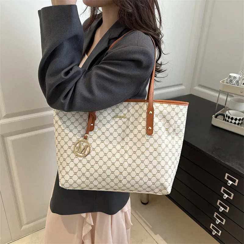PU leather shoulder bag with sewing thread detail in black, shown with measurements.