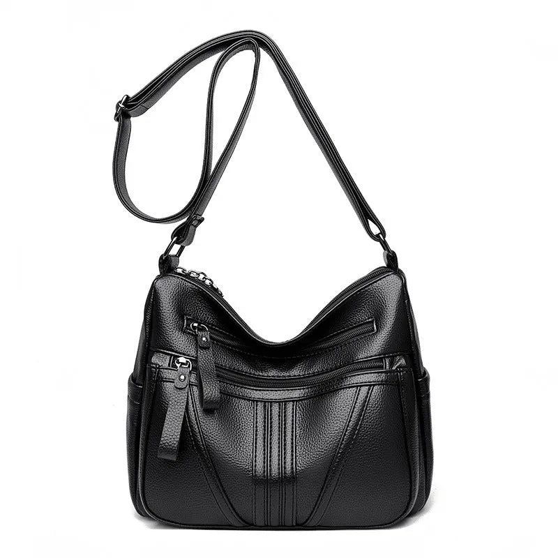 Genuine leather cross-body messenger bag in horizontal square shape with internal organisers