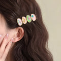 Forest Fairy Korean style side bangs hair clip in pink, plastic and resin construction for women