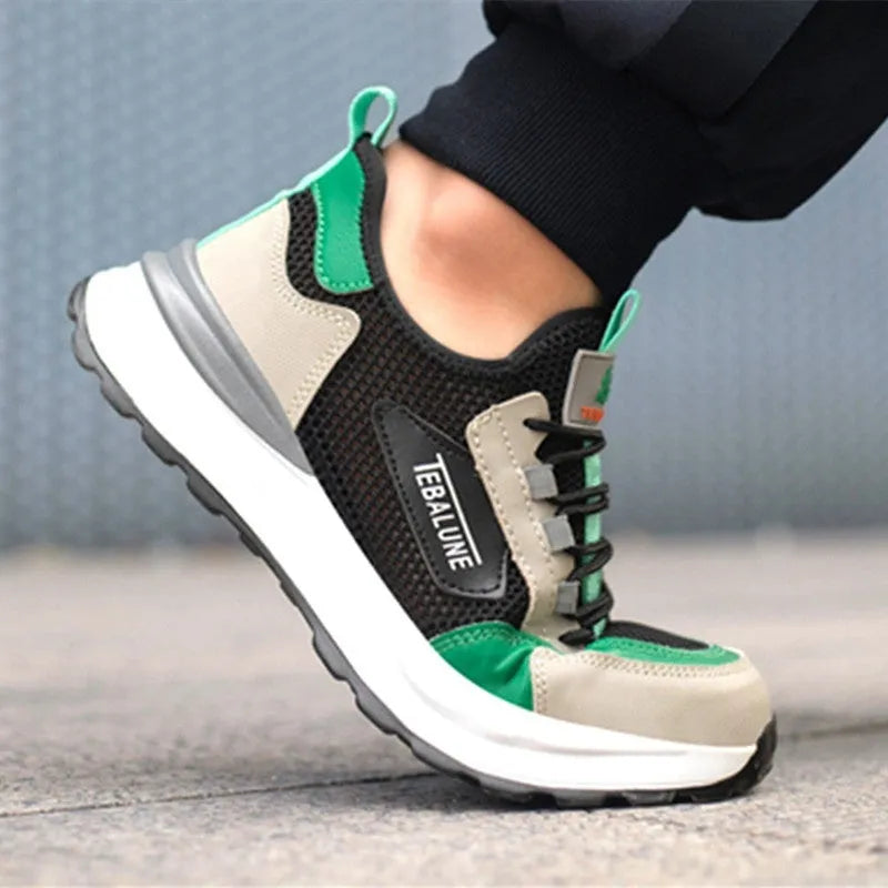 Black and green men's low-top steel toe safety shoes with a mesh upper and plastic toe cap.