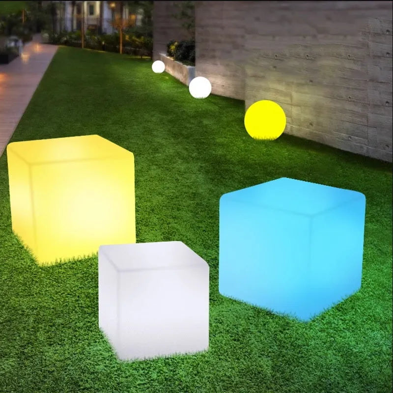Square waterproof LED cube light stool in a modern style for outdoor garden use.