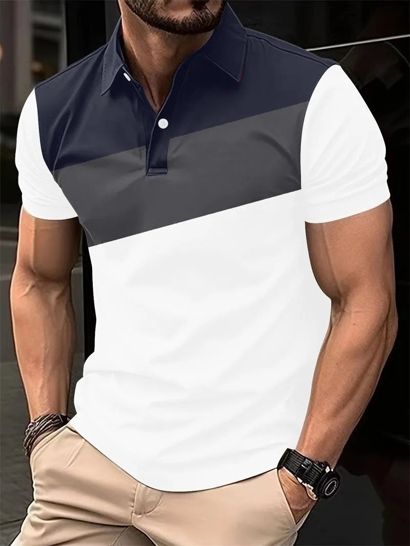 Man wearing a loose-fit grey T-shirt with a colourful 3D digital printed graphic design.