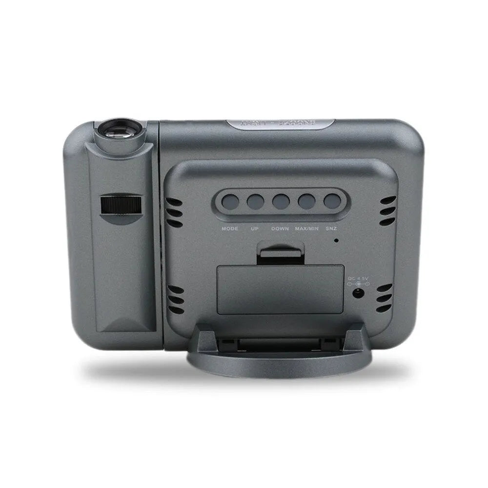 Black digital projection alarm clock with LED display showing time and temperature