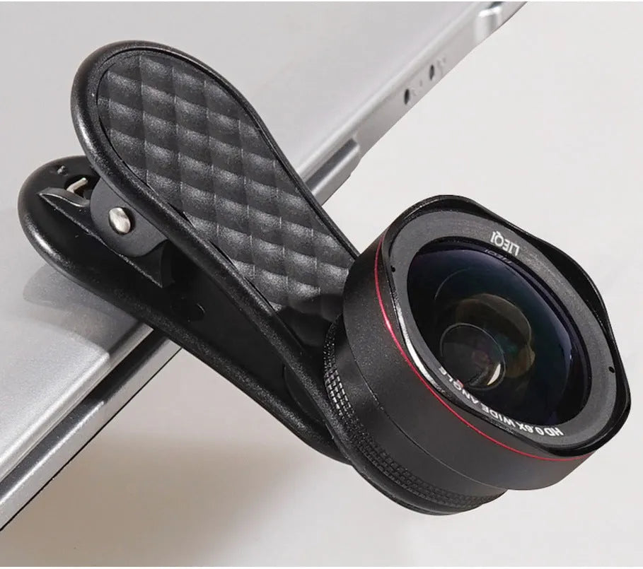 Black mobile phone wide-angle and macro external lens kit with mounting clip and storage box.