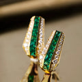 Copper geometric clip-on earrings for women with faux emerald and inlaid zircon in yellow gold
