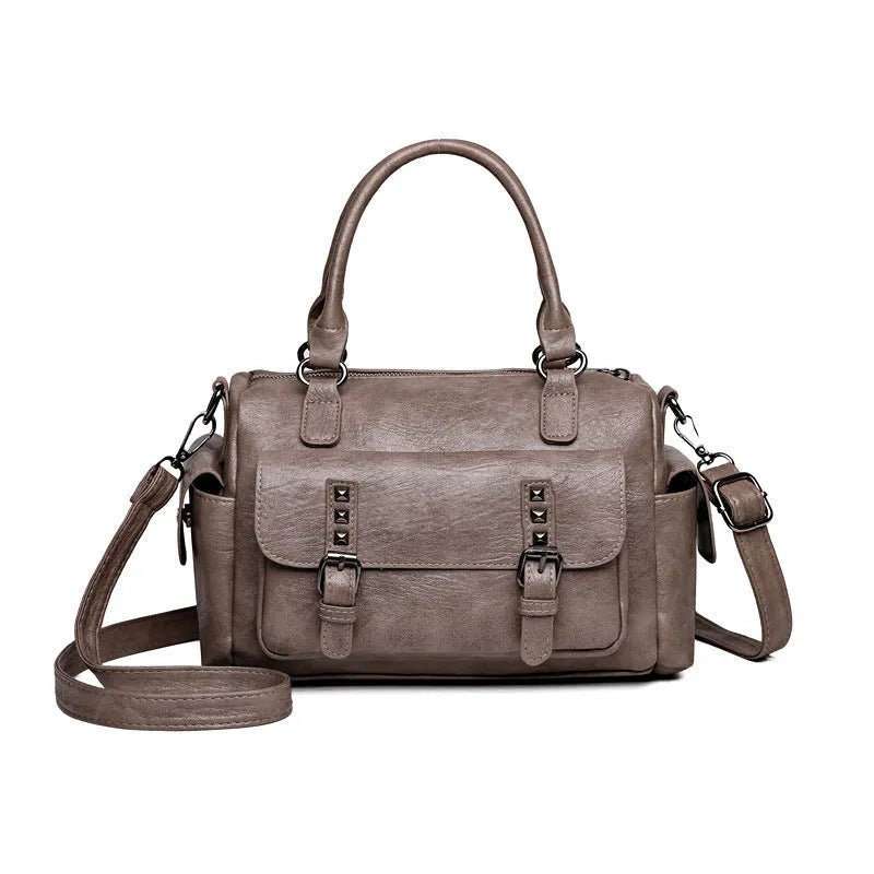 Vintage-style large capacity messenger bag in PU leather, showing contrast stitching and a horizontal square shape.
