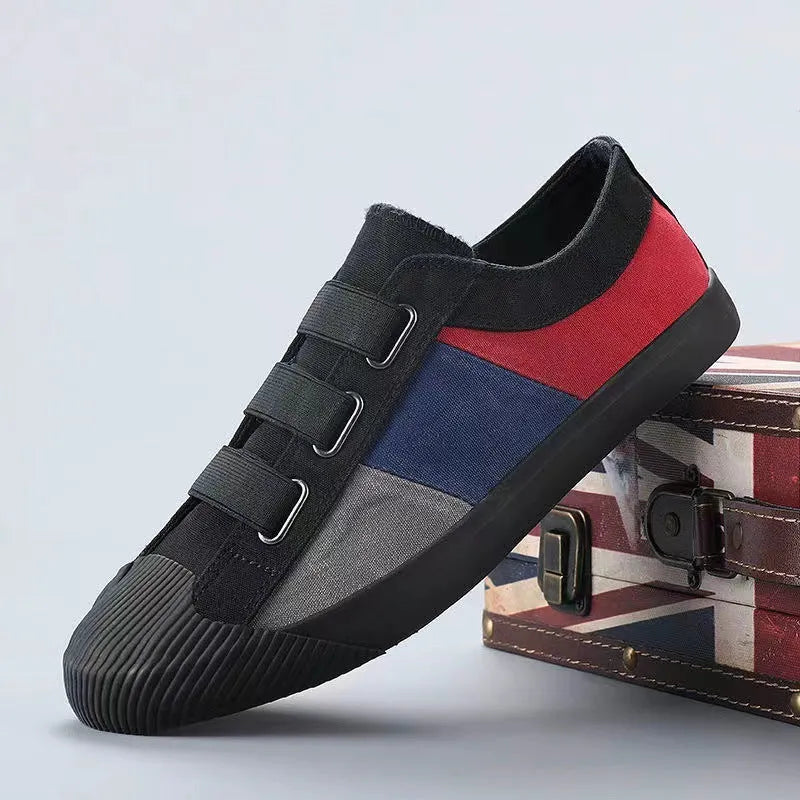 Men's low-top canvas sneakers in beige with colour stitching and an elastic band closure.