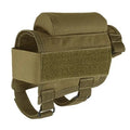 Tactical cheek rest with black nylon surface, hook and loop straps, and removable ammo carrier attached to a rifle stock