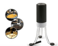 White and black wireless automatic blender with stainless steel stirring arms on kitchen counter