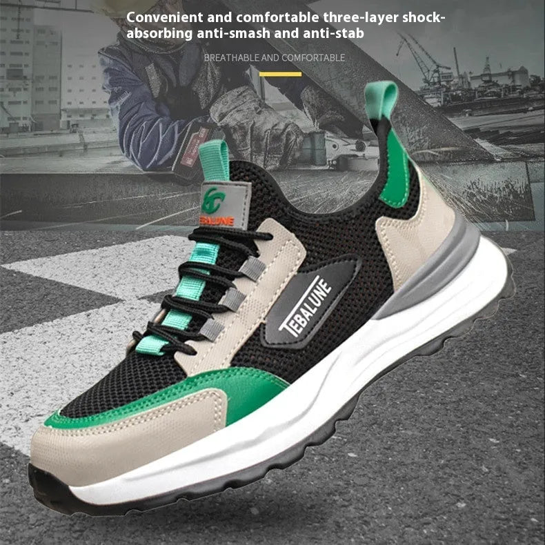 Black and green men's low-top steel toe safety shoes with a mesh upper and plastic toe cap.