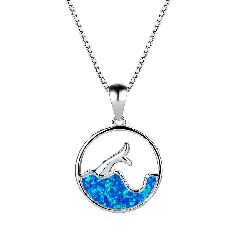 Geometric sea fishtail pendant necklace in electroplated blue opal colour on a copper chain.