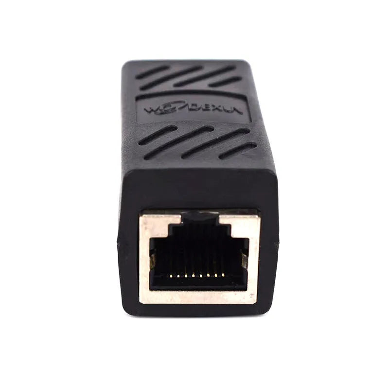 Black RJ45 female to female network cable extender adapter isolated on white