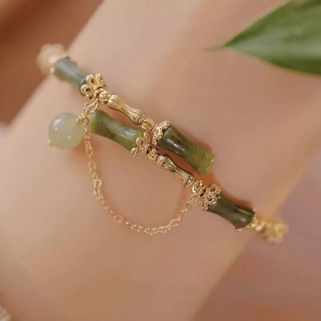 Women's plum wine coloured glaze bracelet with bamboo joint design and glossy baking varnish finish.