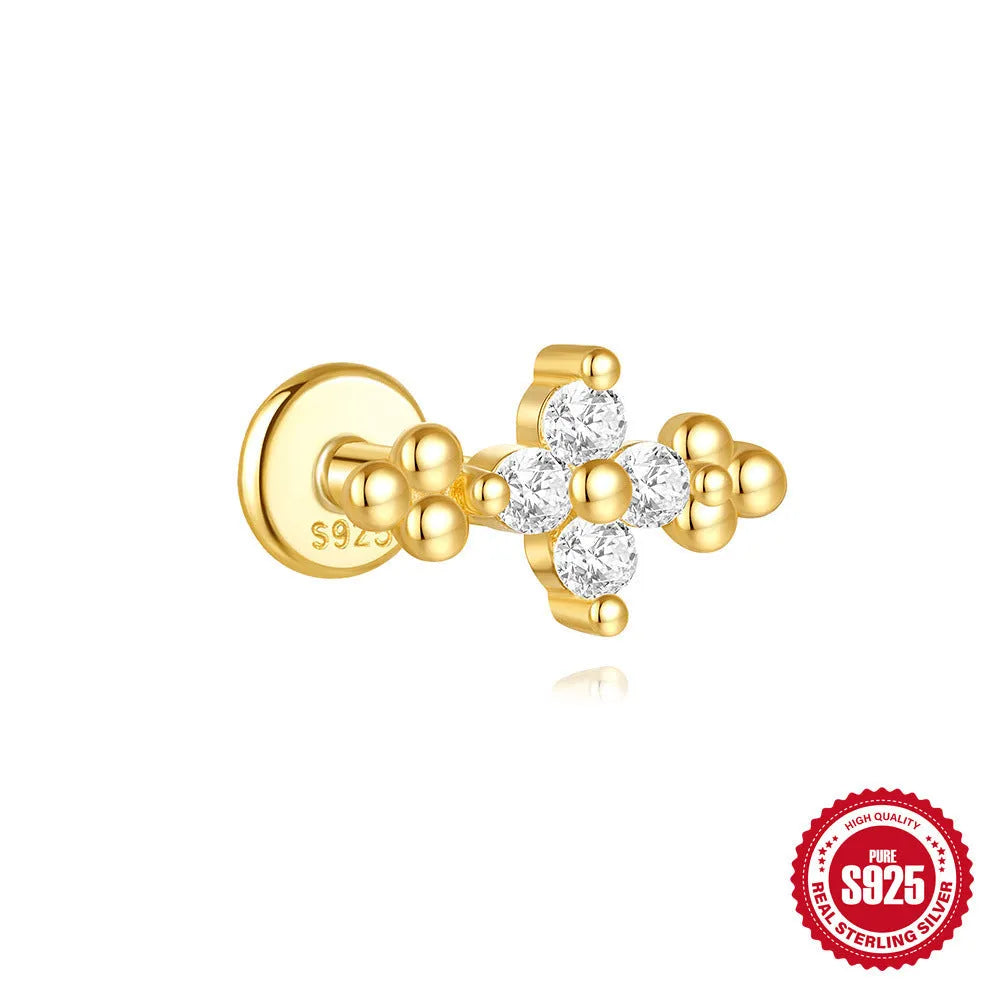 S925 sterling silver geometric moon and star earrings with diamond detail on a gold tone background.