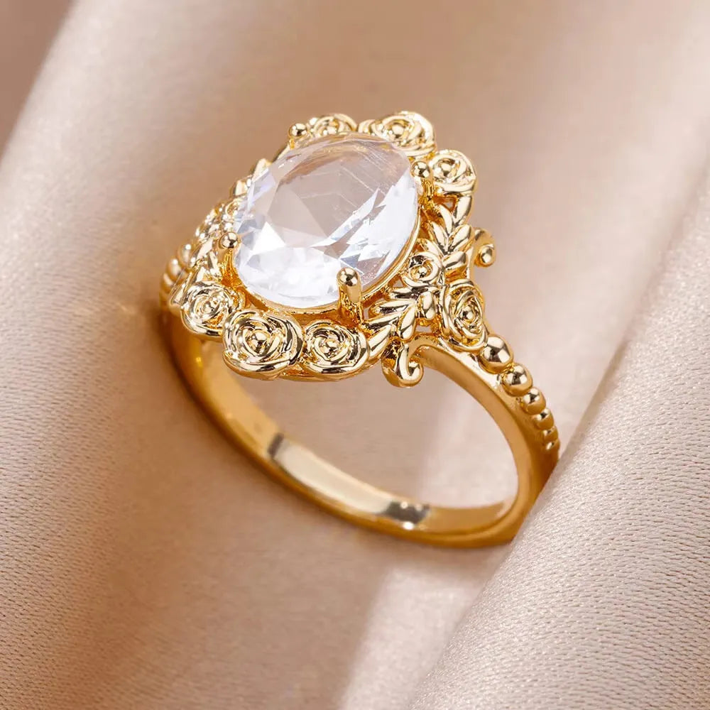 18K gold plated copper open mouth ring with synthetic zircon love emerald motif on white background