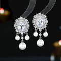 Oval geometric earrings with zircon inlay and pearl tassel drop in copper with colour options
