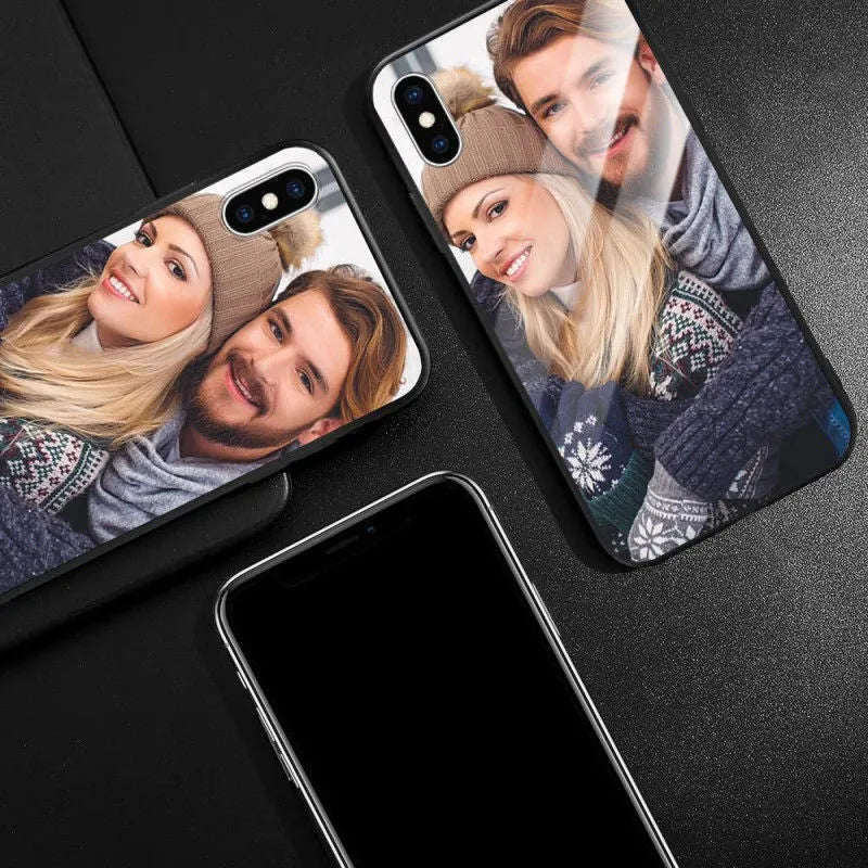 Patterned iPhone case with raised edges on a table next to an iPhone.