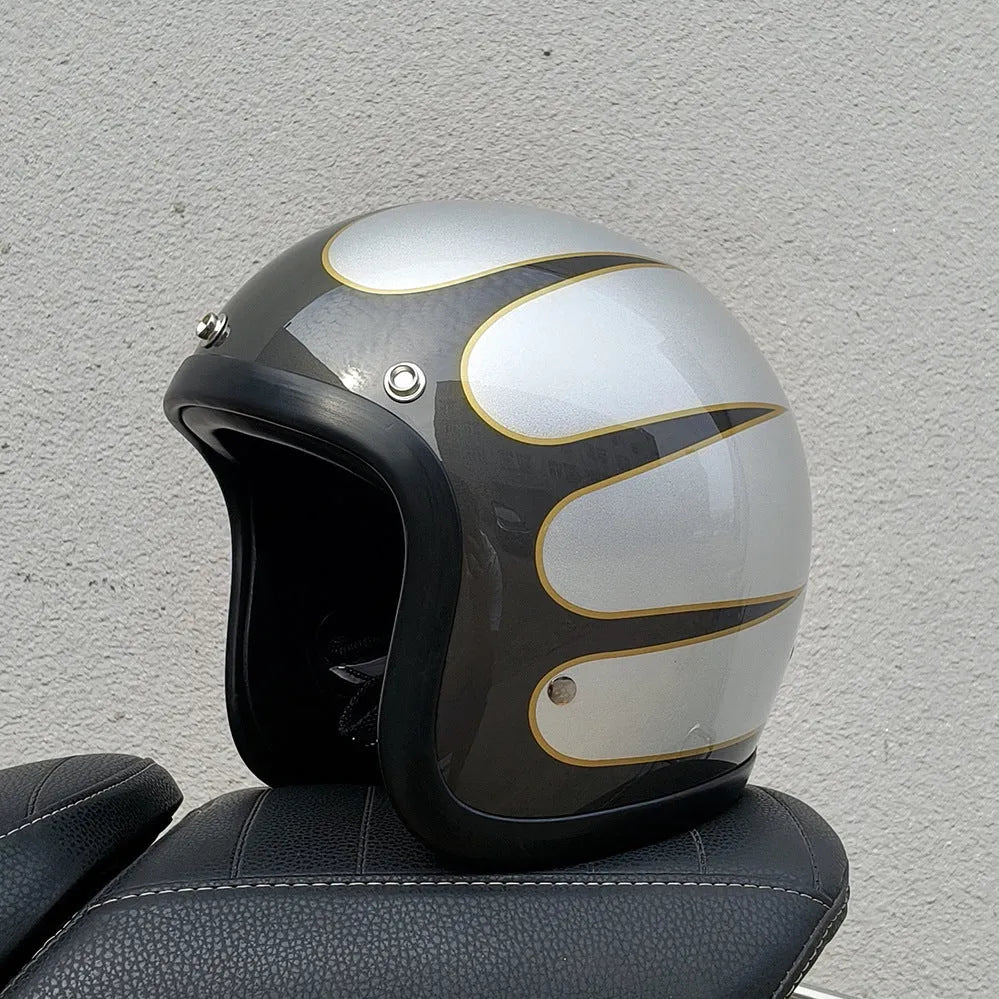 Retro-style motorcycle half helmet in cement grey with a glossy fibreglass shell on a plain background.