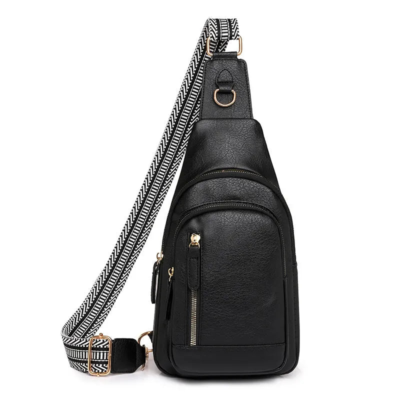 Soft PU women's crossbody chest bag in street style, showing internal zipper organisers.