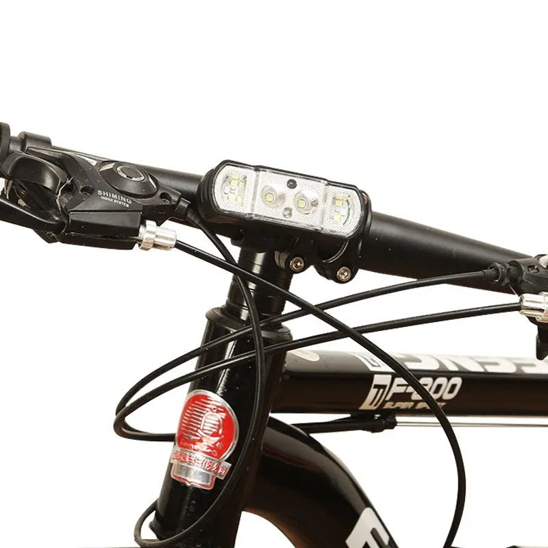 Black bicycle headlight with wave induction control and 350 lumen LED for mountain and road cycling