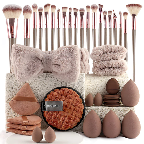 Beauty tool set with multiple pieces in brown, pink and purple colours for face wash and makeup application