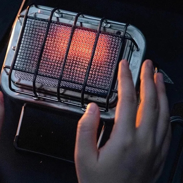 Portable stainless steel electric heating stove with ceramic elements, shown with dimensions.