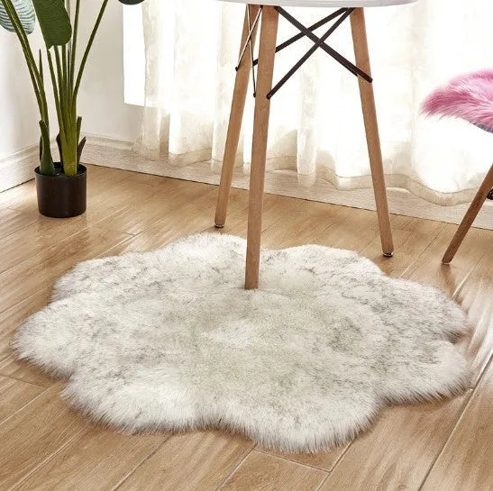 Artificial woolen carpet rug in floral plum blossom shape, plush fabric, available in multiple colours and sizes