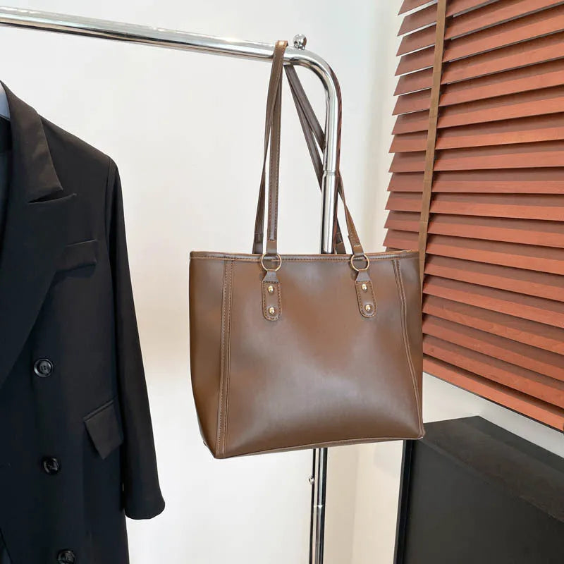 Korean style square shoulder underarm crossbody bag in PU leather, showing sandwich pocket detail.
