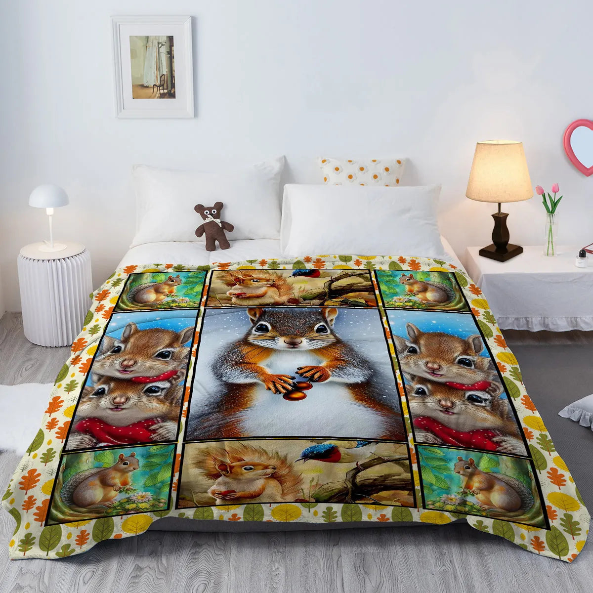 Yellow flannel blanket with white-bellied squirrel print, 130x150cm, folded on sofa