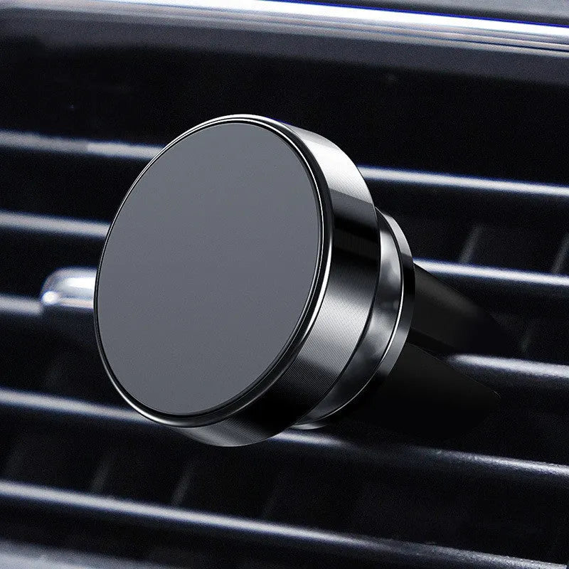 Aluminium alloy magnetic car phone holder in black, gold, or silver with paste or snap mounting.