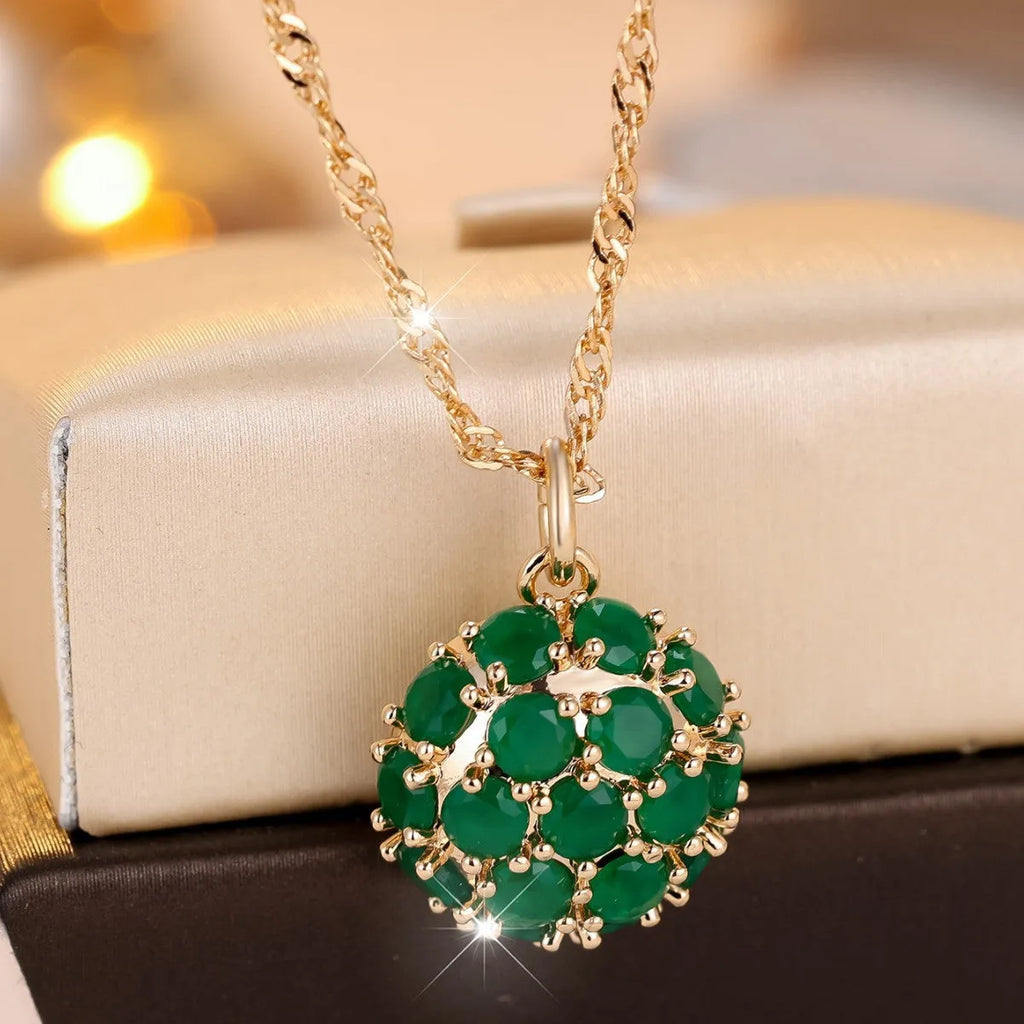 Round emerald diamond necklace with geometric pendant on gold plated chain