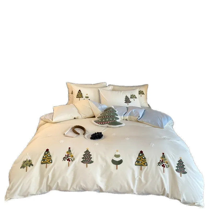 Cream blue duvet cover with embroidered Christmas tree and towel motif, part of a 100% cotton four-piece bedding set.