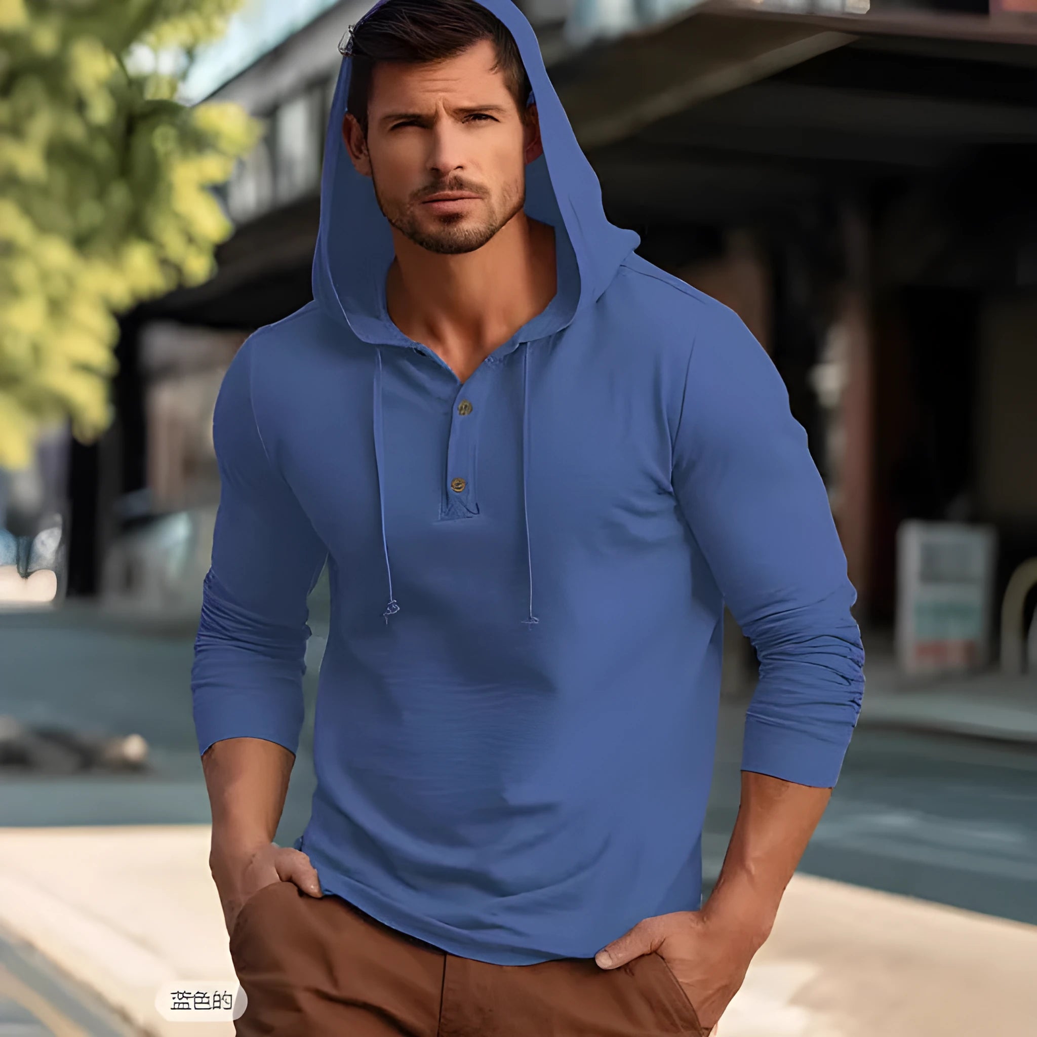A dark blue cotton pullover hoodie with long sleeves on a hanger.