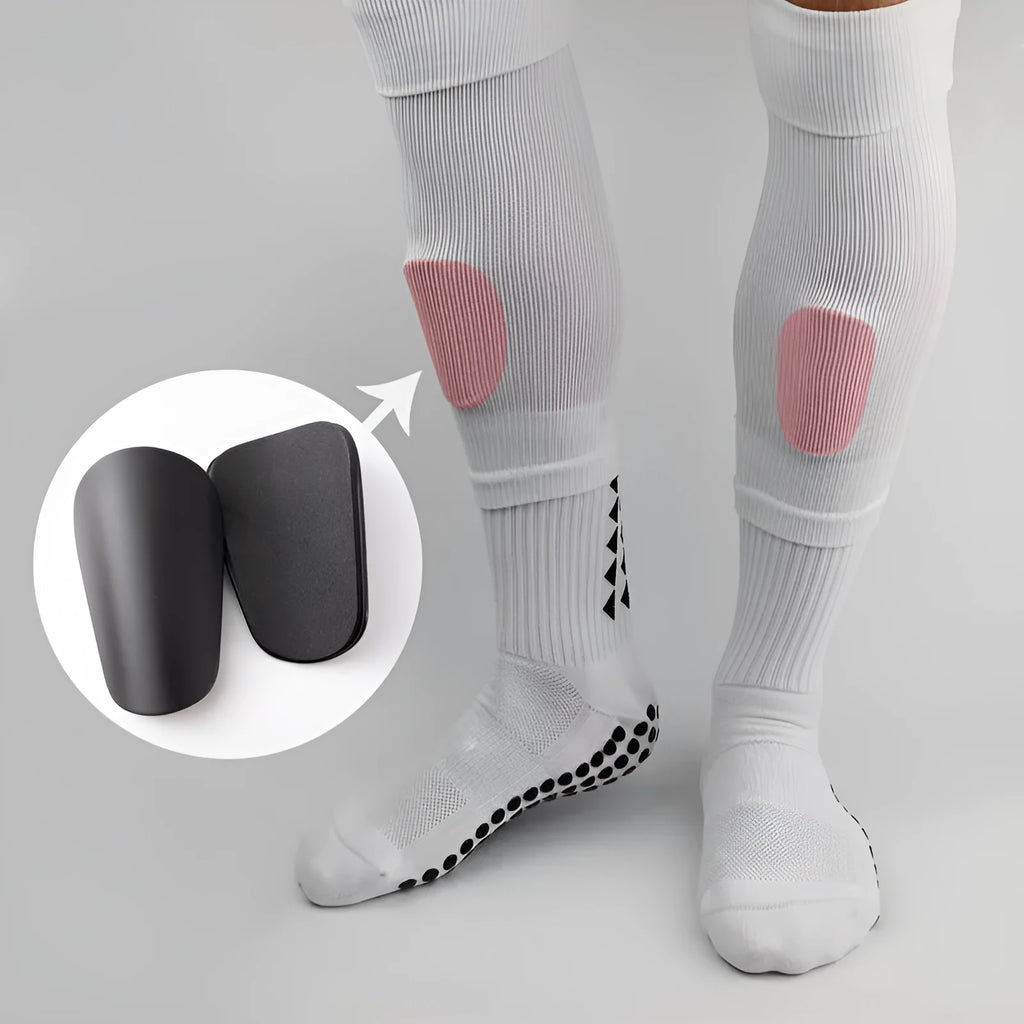 Two pairs of PU mini shin guards for sports protection in various colours on a white background.