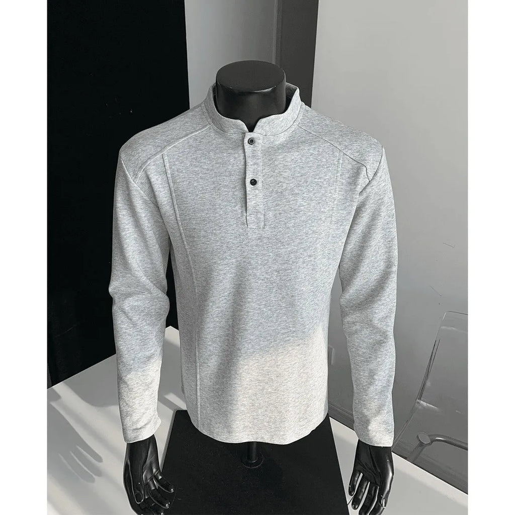 Men's grey asymmetric patchwork polo shirt with a stand-up collar, long sleeves, and a loose fit.