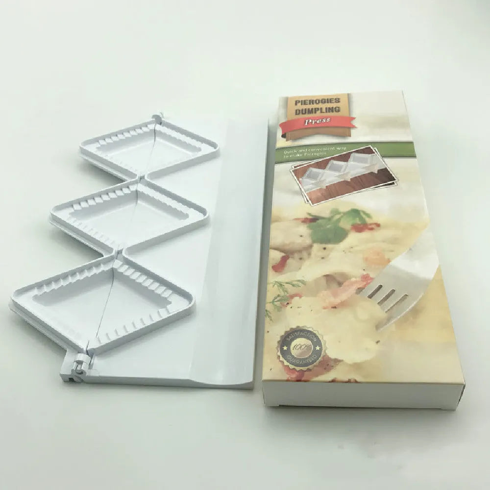 Pure white plastic dumpling maker 28.5cm length on a kitchen counter