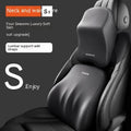 Black memory foam car headrest pillow and lumbar support pillow on a car seat