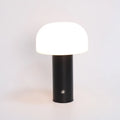 Plastic USB table lamp with charging port in black, white, orange, or green colour.
