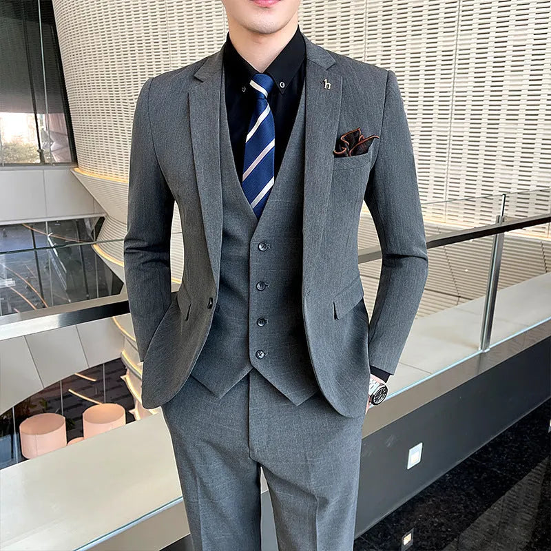 Slim fit men's business suit in British style cut, available in black or dark grey cotton blend fabric