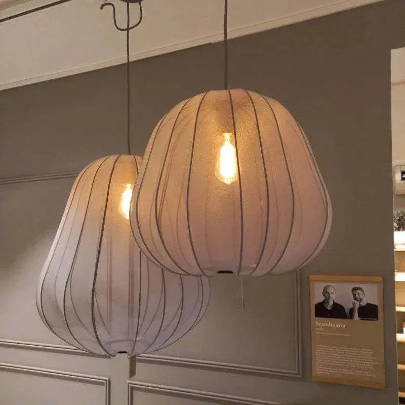 Japanese-style spherical ceiling lamp with an open iron branch design, hanging with a grey-blue finish and an LED light inside.