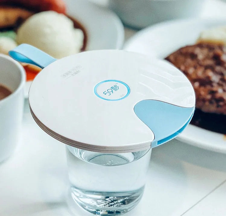 Blue portable UV baby bottle steriliser with USB charging port and compact dimensions