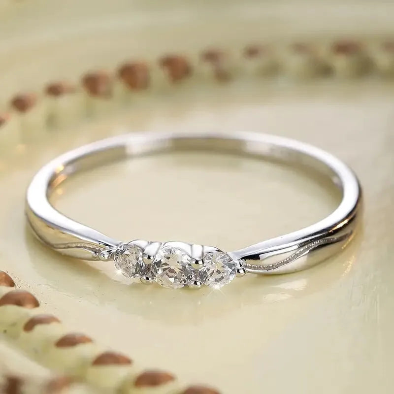 S925 sterling silver ripple wave gang drill small ring on white background, white gold colour texture