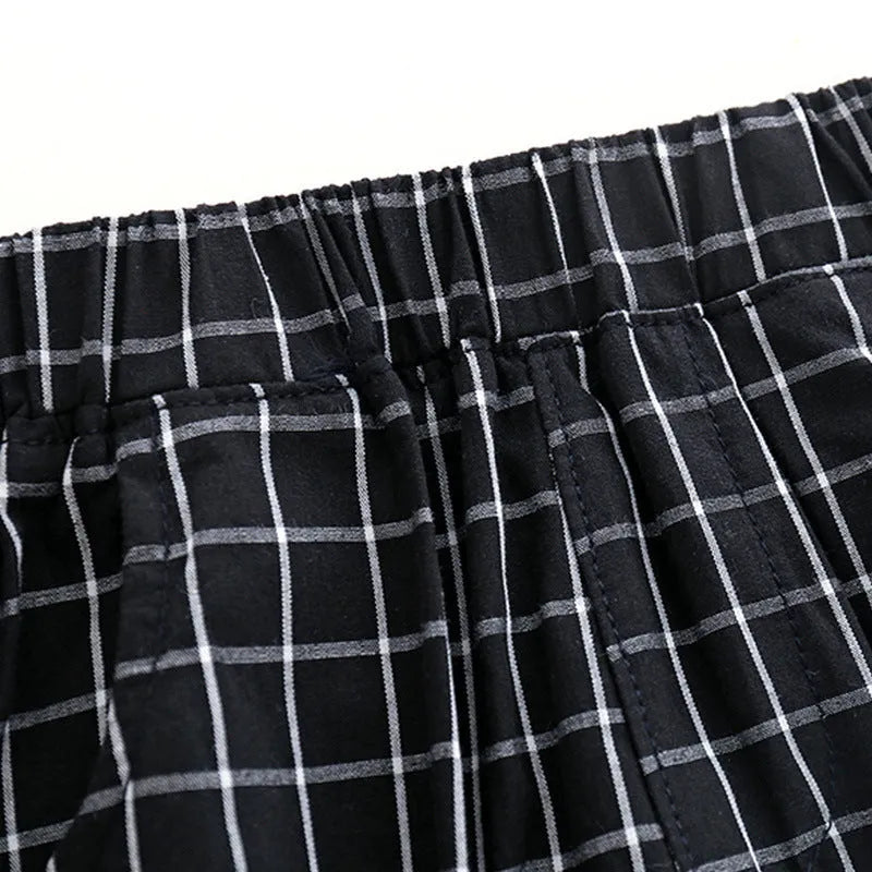 Boys casual two-piece cotton pants suit set in black with shirt and trousers on child model