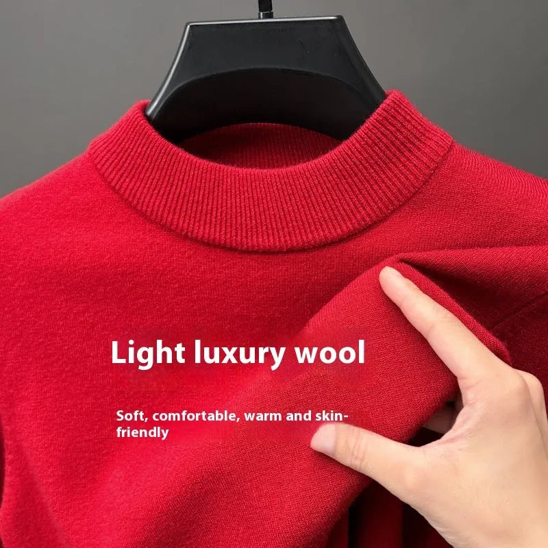 Men's fine wool half turtleneck sweater in a solid colour, showing long sleeves and regular fit.