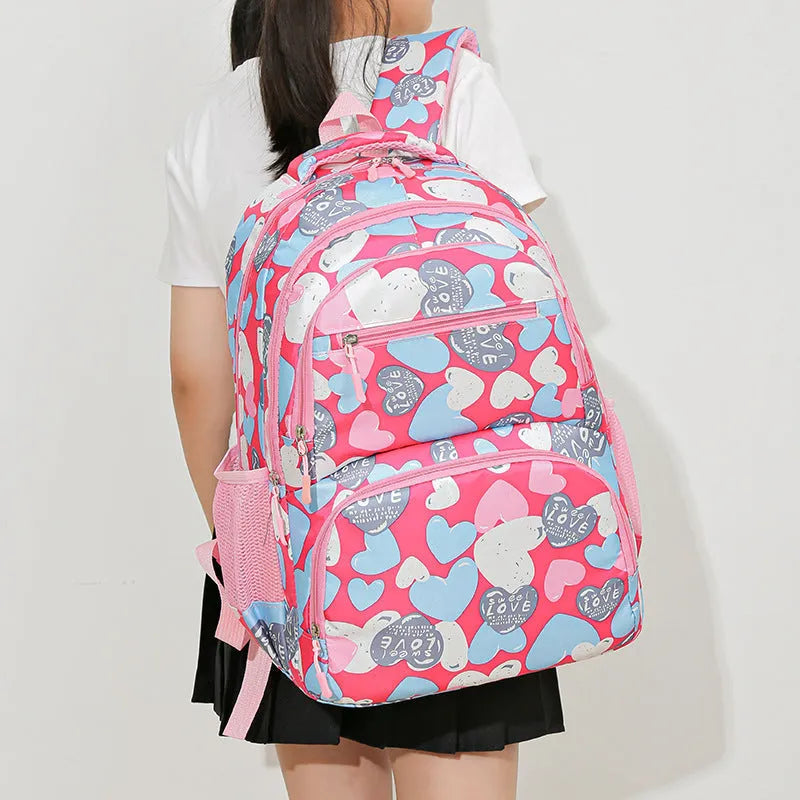 Blue children's school backpack with air pillow straps and large main compartment.