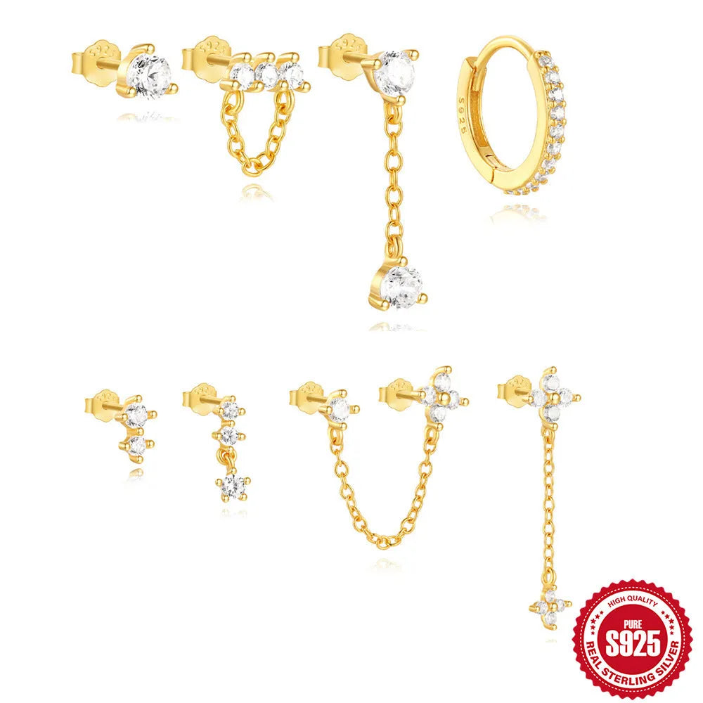 Simple geometric sterling silver earrings with a clover petal design and electroplated gold accents.