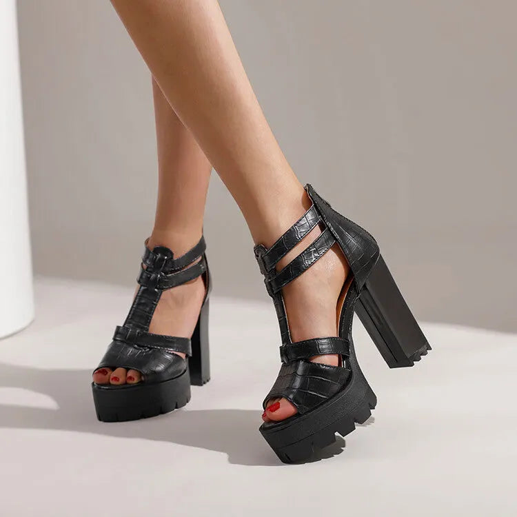 Women's black platform high heel sandals with round toe and back zip fastening.